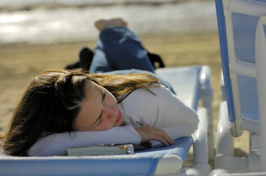 Woman relaxing on the beach