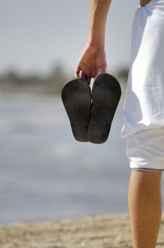 Man holding thongs