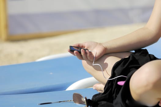 Woman relaxing on the beach