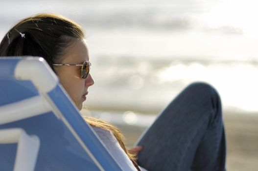 Woman relaxing on the beach