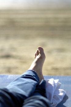 Woman relaxing on the beach