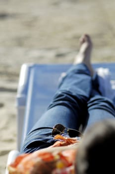 Woman relaxing on the beach