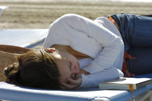 Woman relaxing on the beach