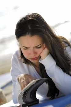 Woman reading on the beach