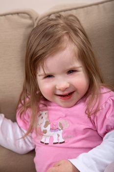 Portrait of little handicapped caucasian girl with Down Syndrome