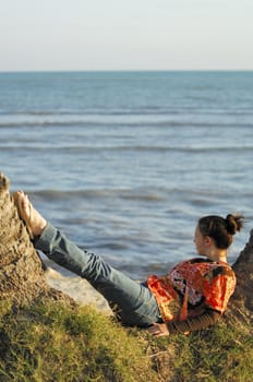 Woman relaxing on the beach