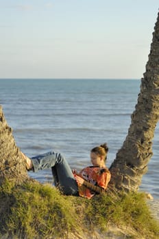 Woman relaxing on the beach