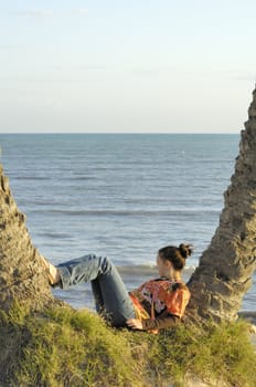 Woman relaxing on the beach