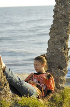 Woman relaxing on the beach