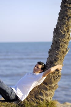 Man relaxing on the beach