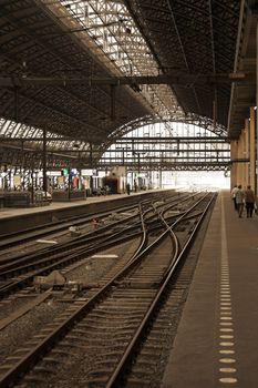 Amsterdam railway station, no trains, some people on platforms