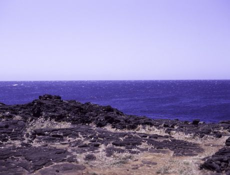 The sea, with lava rocks on the west coast of Hawaii's Big Island