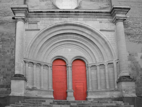 Door of the cathedral in Lescar, France, partly converted to b/w