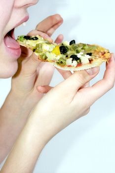 Girl is going to eat pizza with vegetables and cheese