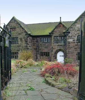 An old picturesqu sandstone cottage