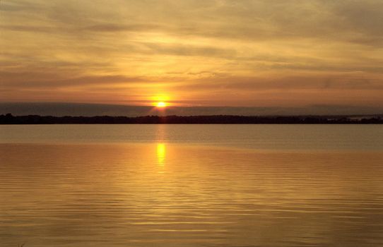 Sunset at a big calm lake