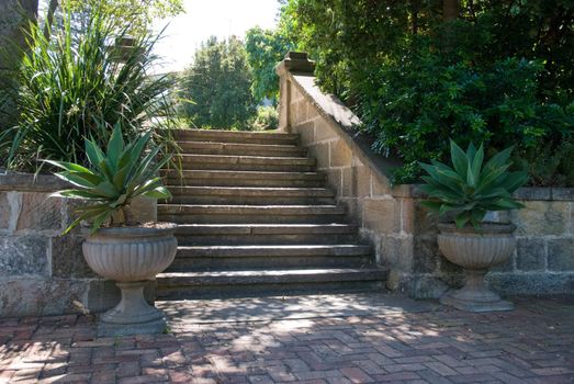 Stone ladder in a park at summer time