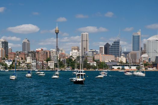 Australia, Sydney seafront with sky-scrapers, yachts and sunshine