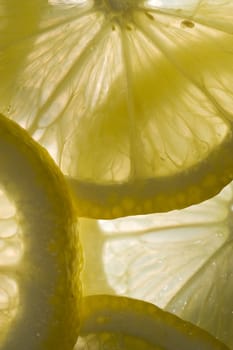 Tangy slices of lemon shot as a macro