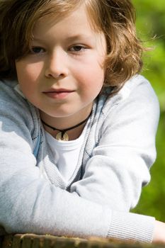 Young boy is looking into the field