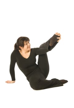 Woman doing exercises on white background