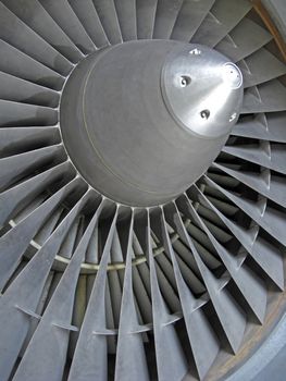 Close-up of the blades of a jet engine.