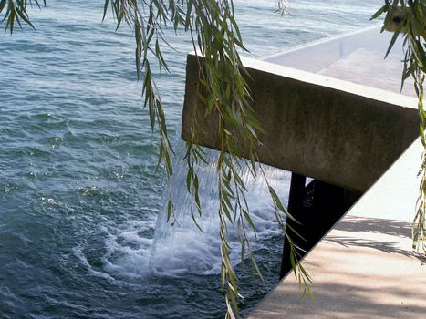 waterfall over dike in lake ontario