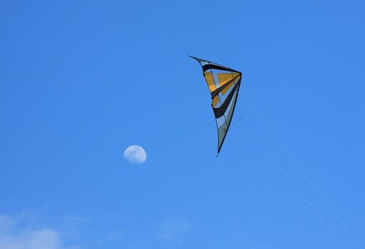 One kite trying to reach the moon.