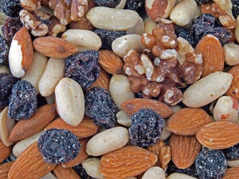 Closeup of  healthy mixted fruit and nuts.
