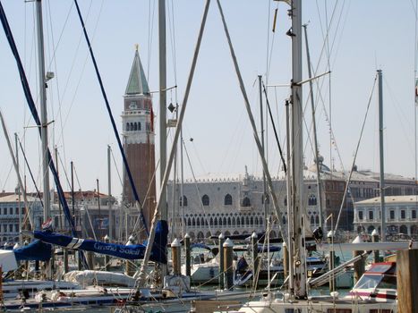 
yachts harbour on San Giorgio Maggiore island in venetian lagoon. View of tower bell San Marco and Dodge Palace.Venice - Italy - europe - 2008