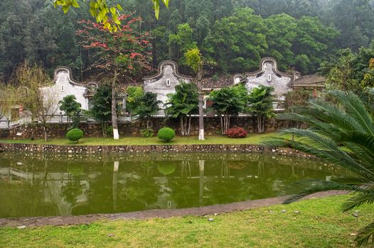 Baolin Temple in Shunde with water reflection and forest background near Guangdong China