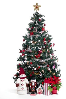 Cristmas tree, snowman and gifts image on white background