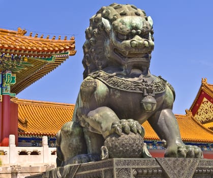 Bronze lion near the entrance to Emperor Temple in Forbidden City