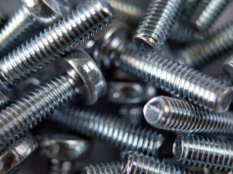 Close up photo of  bolts used in construction.