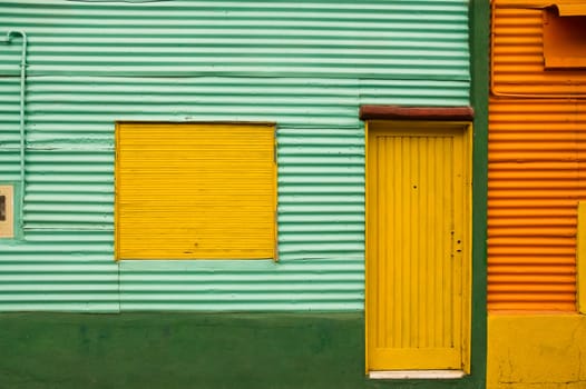 Colorful houses  in La Boca, Caminito, a tourist attraction in Buenos Aires, Argentina.