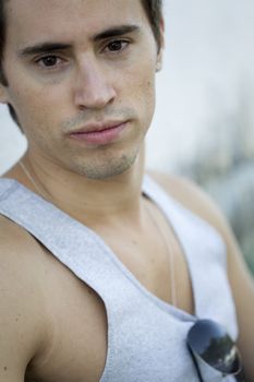 A young male model from Brazil in outdoors photograph.