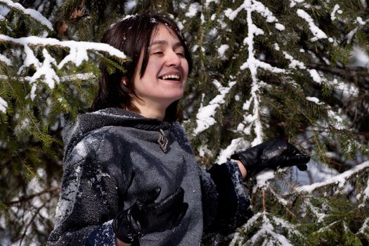 Girl in gray dress and snow tree
