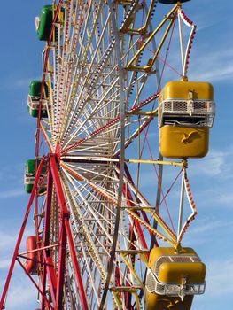 Ferris Wheel on blue sky 