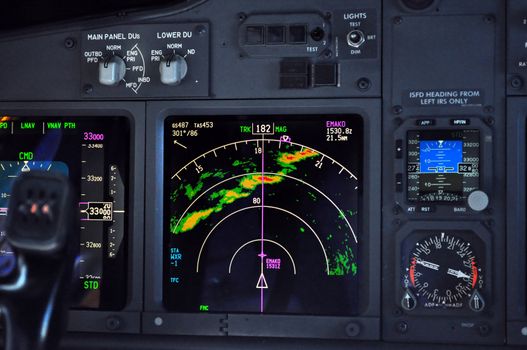 Commercial airliner approaches line of thunderstorms at 33000 ft