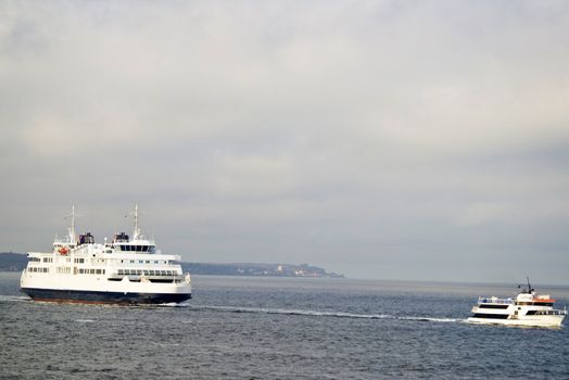 Two ferry boats at Nordic sea at travel line Helsingor, Denmark - Helsinborg Sweden