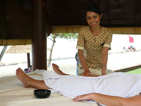 White woman on massage in Bali salon