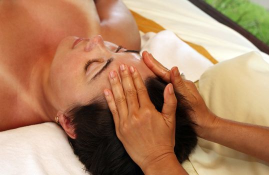 White woman on massage in Bali salon