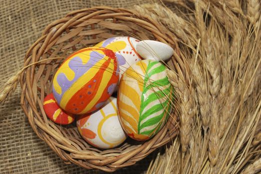 the wooden Easter egg with decorative painting, nursery work