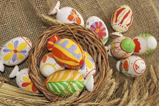 the wooden Easter egg with decorative painting, nursery work