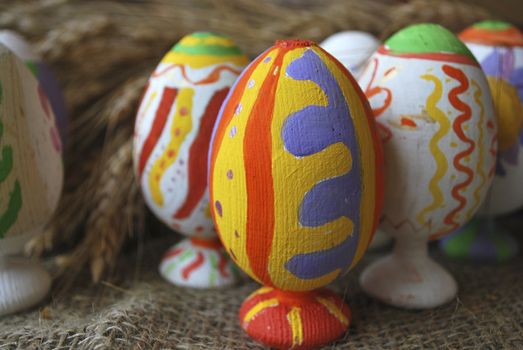 the wooden Easter egg with decorative painting, nursery work