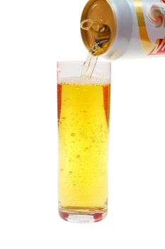 Pouring beer to glass isolated on white