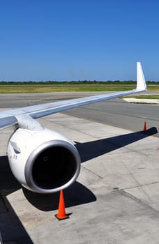 Commercial airliner: wing and engine detail.