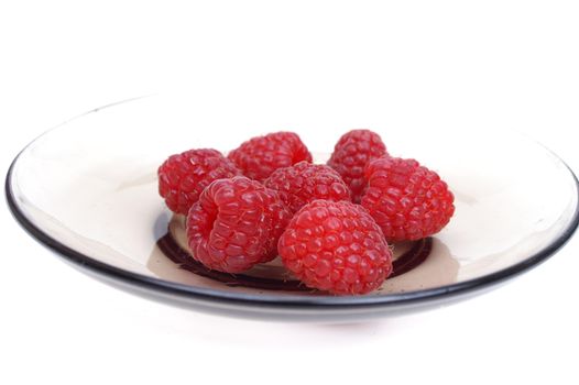 Raspberry on glass  cup