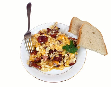 Scrambled eggs on plate with bread isolated on white