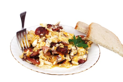 Scrambled eggs on plate with bread isolated on white